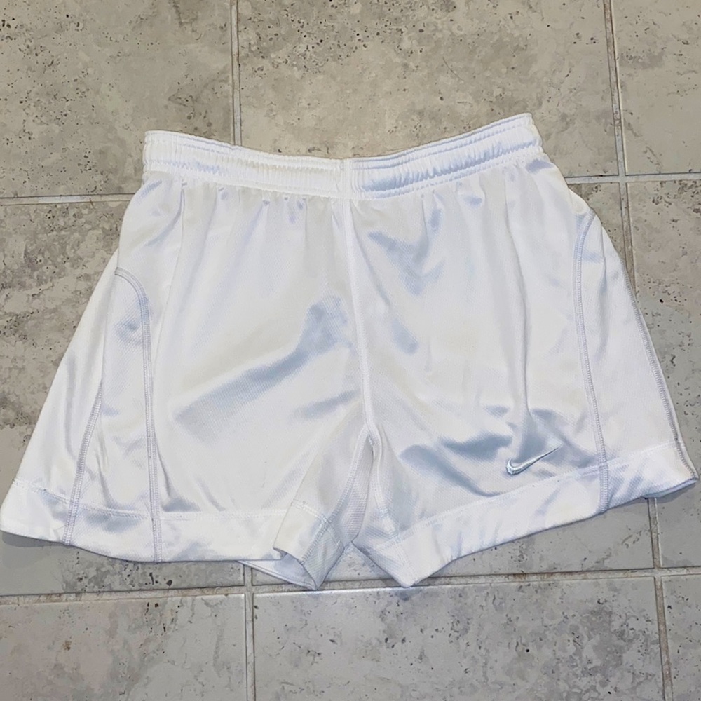 White Nike shorts